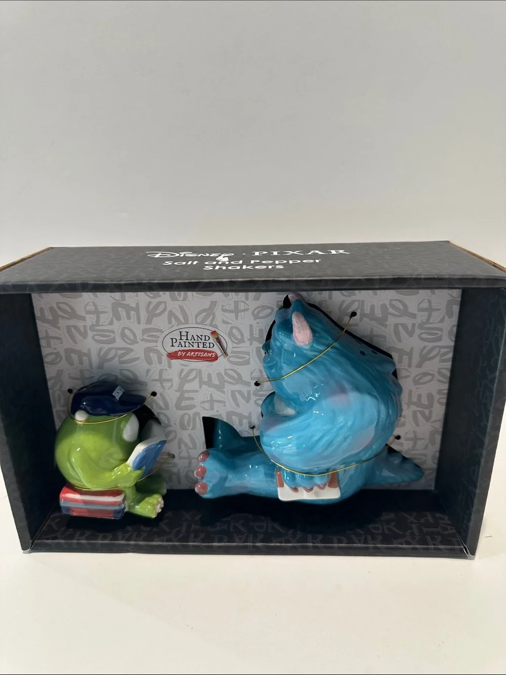 Disney Pixar’s Hand Painted Ceramic Salt & Pepper Shakers.